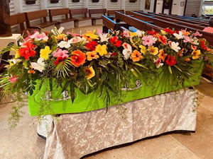 Hibiscus covered casket